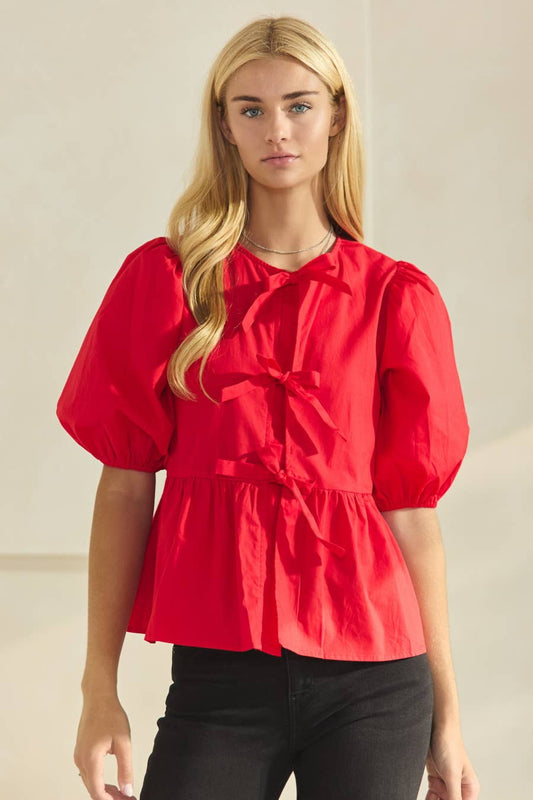 Chic Red Peplum Blouse with Tie-Front Bows | Puff Sleeve Cotton Top